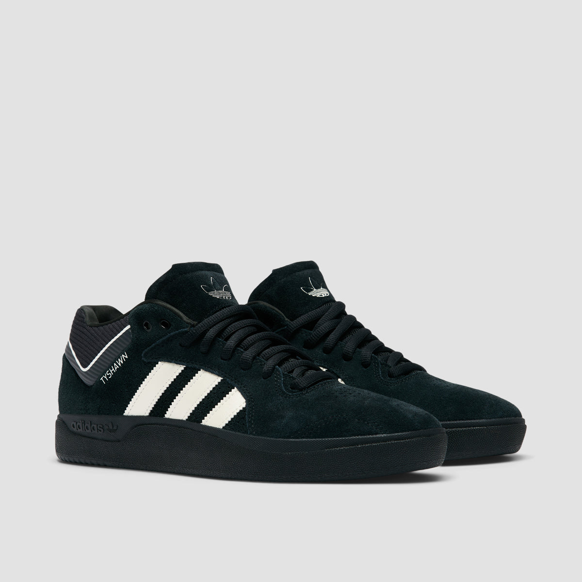 Adidas black mid tops on sale