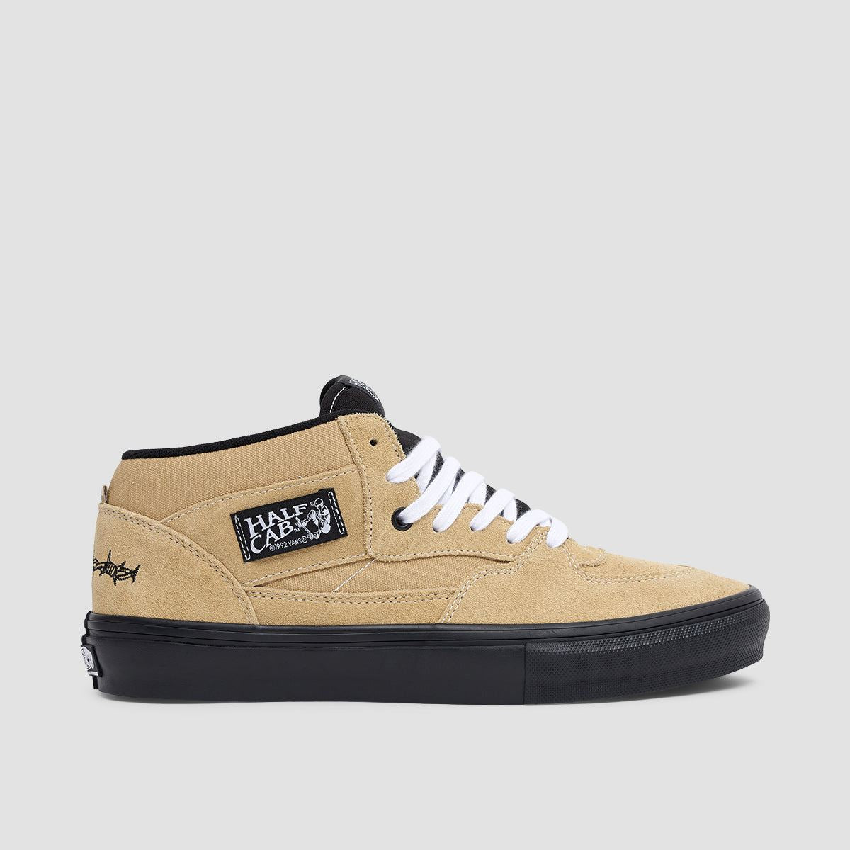 Khaki and store black vans