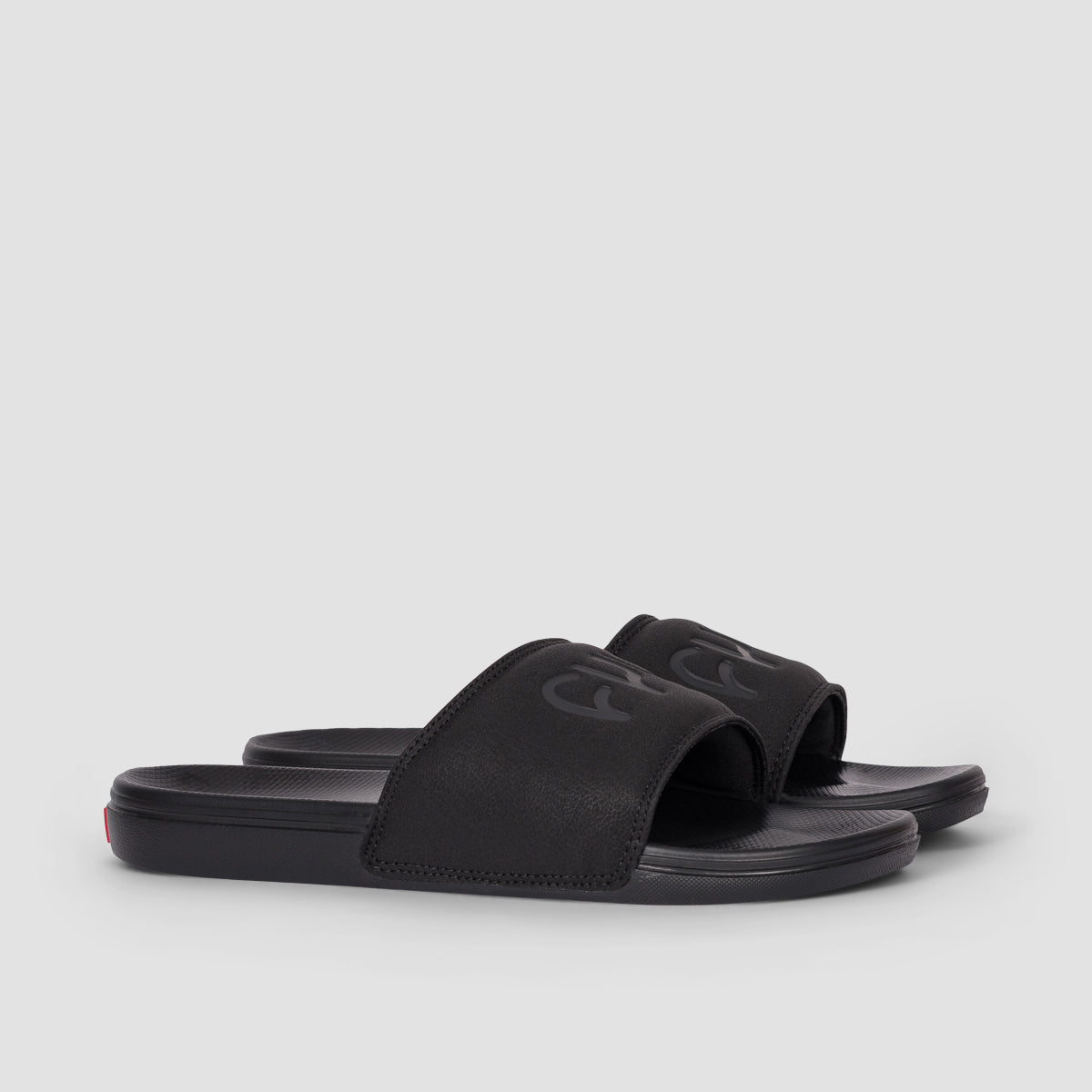 all black vans slides